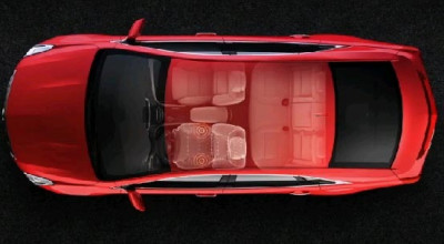 Cadillac introduce sistemul de alertă cu vibraţie în scaune - Photo