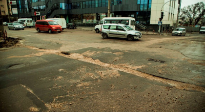 Vremea trece, vremea vine, gropi în asfalt 