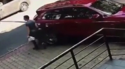 VIDEO: Proprietara unui Porsche Cayenne a 