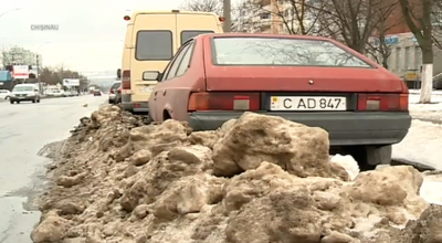 (VIDEO) Parcările acoperite de mormane de gheață. Păreri? - Photo