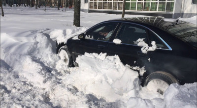 (VIDEO) Deszăpezirea nu e pentru Audi! Iată cum a ieșit din mormane acest Audi A8 quattro - Photo