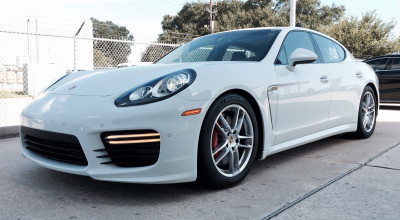 Proprietarul unui Porsche Panamera, a primit despăgubiri de 60.000 lei după ce a dat cu roata într-o gură de canalizare - Photo