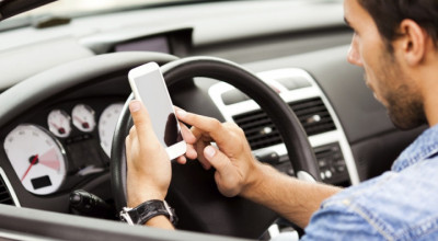 Atenție șoferi! Amenzi dure pentru cei ce folosesc telefonul la volan, pe drumurile din România - Photo