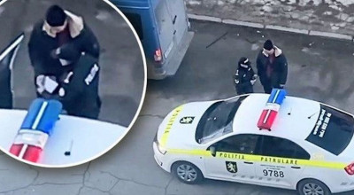 VIDEO VIRAL: Momentul în care un șofer i-ar fi dat mită unui angajat al INP! - Photo