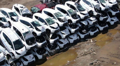 (VIDEO) Zeci de vehicule electrice au ajuns la gunoiște după ce o companie de car sharing a falimentat! - Photo