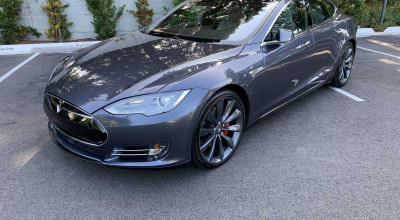 Un șef de la CNA și-a cumpărat o Tesla Model S! Află cum justifică achiziția ofițerul anticorupție - Photo