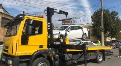Vezi poze pe viu cu procesul de evacuare a mașinilor parcate neregulamentar pe străzile din Chișinău - Photo
