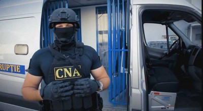 CNA a reținut angajatul unei școli auto care a cerut mită de 500 euro de la un elev! - Photo