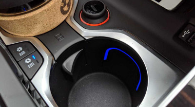 BMW a fost acționat în judecată din cauza construcției suportului de pahare! - Photo