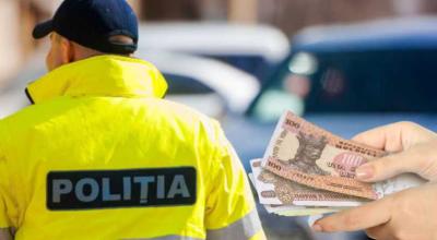7 cazuri de corupere în doar 24 de ore. Conducătorii auto încearcă orice metode pentru a evita sancțiunile - Photo